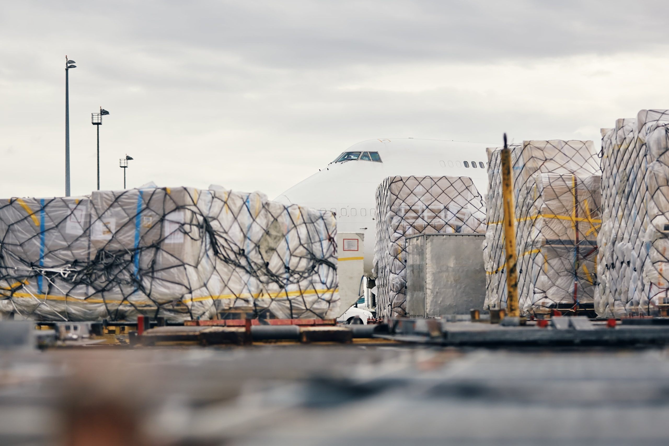 Loading of cargo containers to plane at airport 2025 02 16 09 41 06 utc min