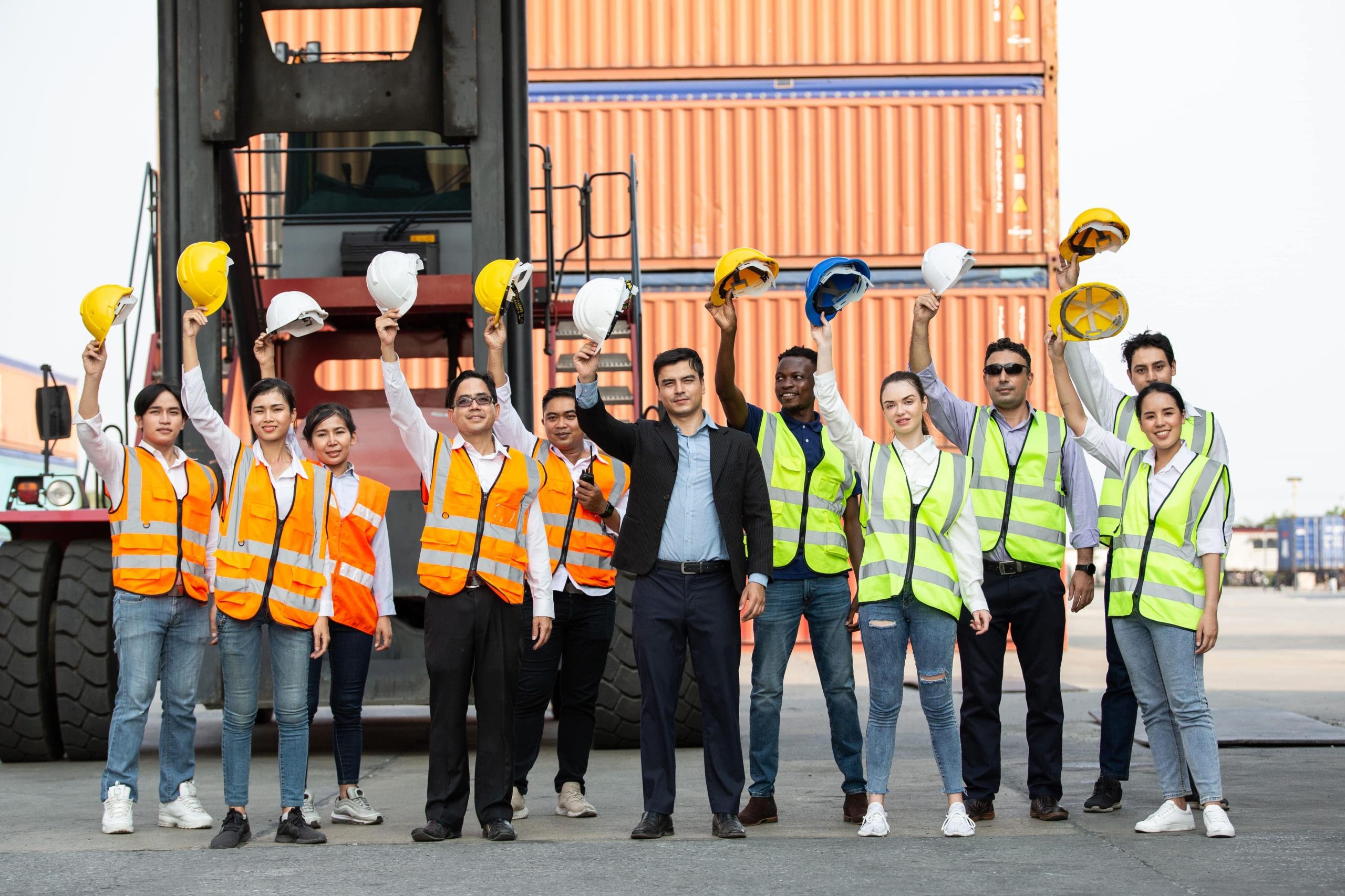 Group of logistic worker lifting hardhat up in the 2025 03 06 04 36 20 utc min min