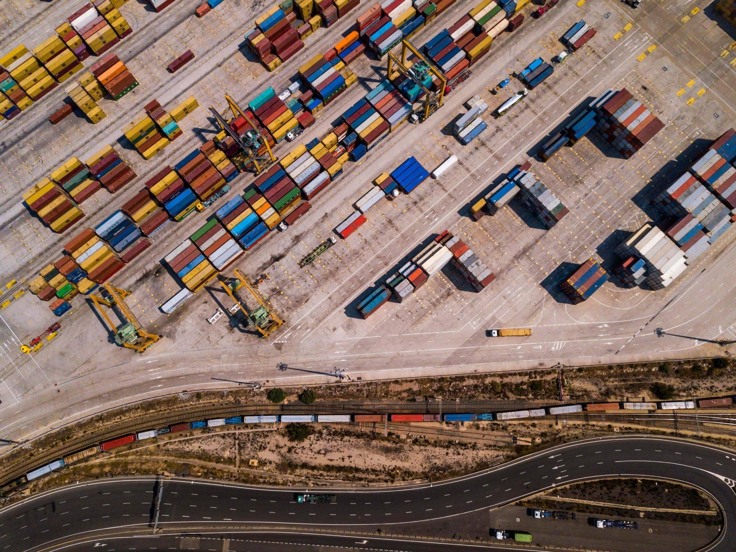Industrial cargo area with container ship in dock 2025 01 07 20 12 10 utc min min (1)